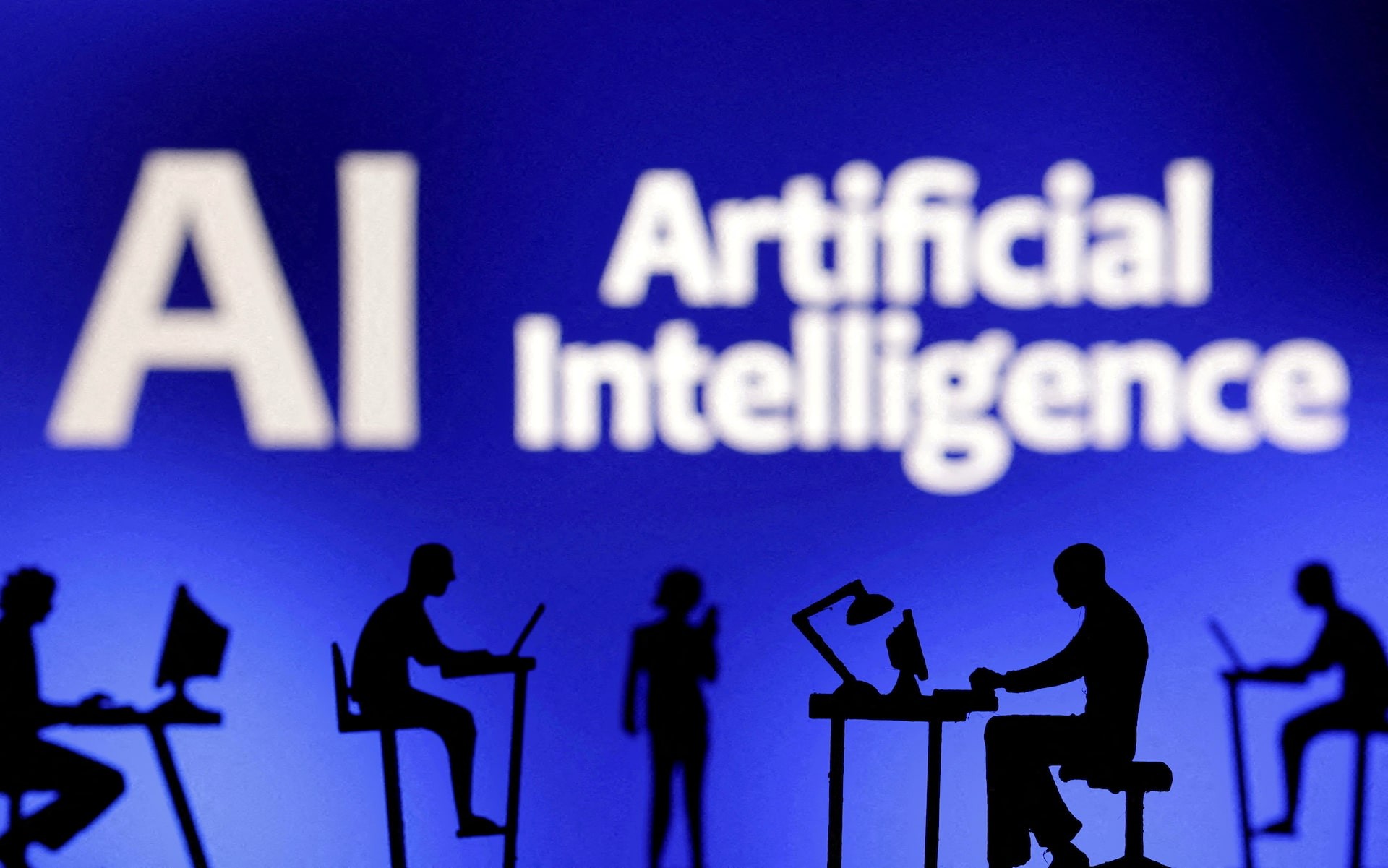 Blue background shows "AI Artificial Intelligence" text with silhouetted people working at desks. Blue background shows "AI Artificial Intelligence" text with silhouetted people working at desks.