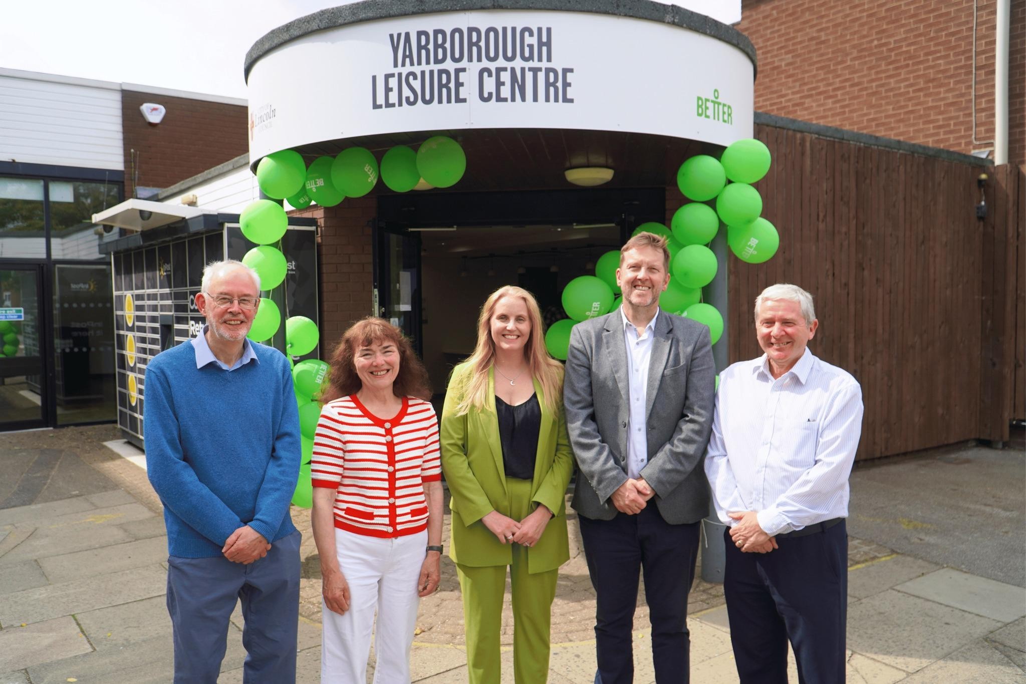 Five people pose for a photo in front of Yarborough Leisure Centre with green balloons. Five people pose for a photo in front of Yarborough Leisure Centre with green balloons.