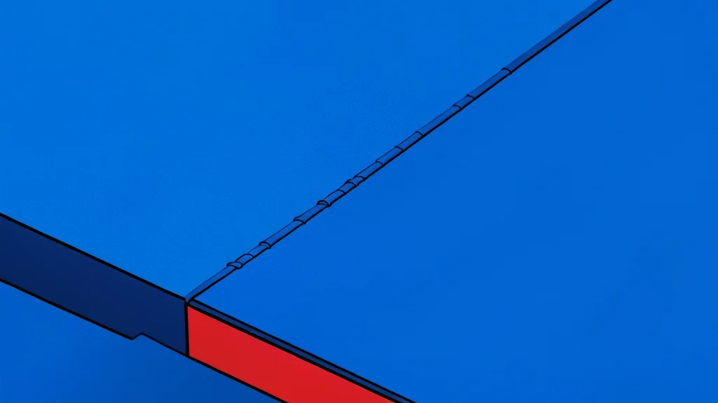 A red and white judo gi uniform lying flat on a blue competition mat