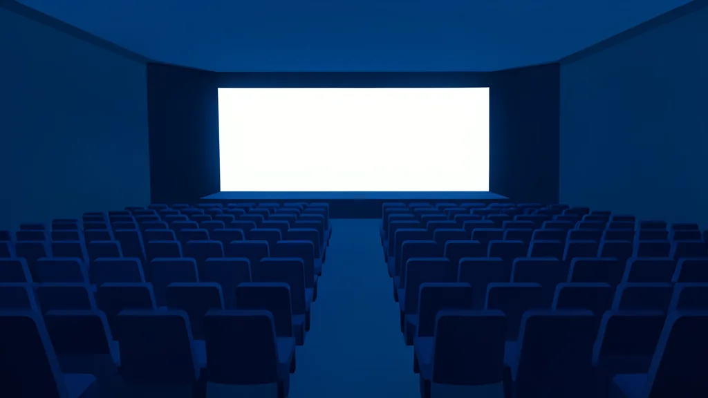 A large, dimly lit convention hall with a massive stage screen glowing in the distance and rows of empty seats