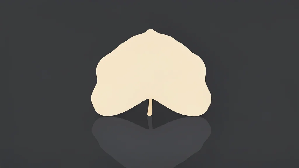 A traditional Japanese wooden ginkgo leaf resting on a polished dark table surface