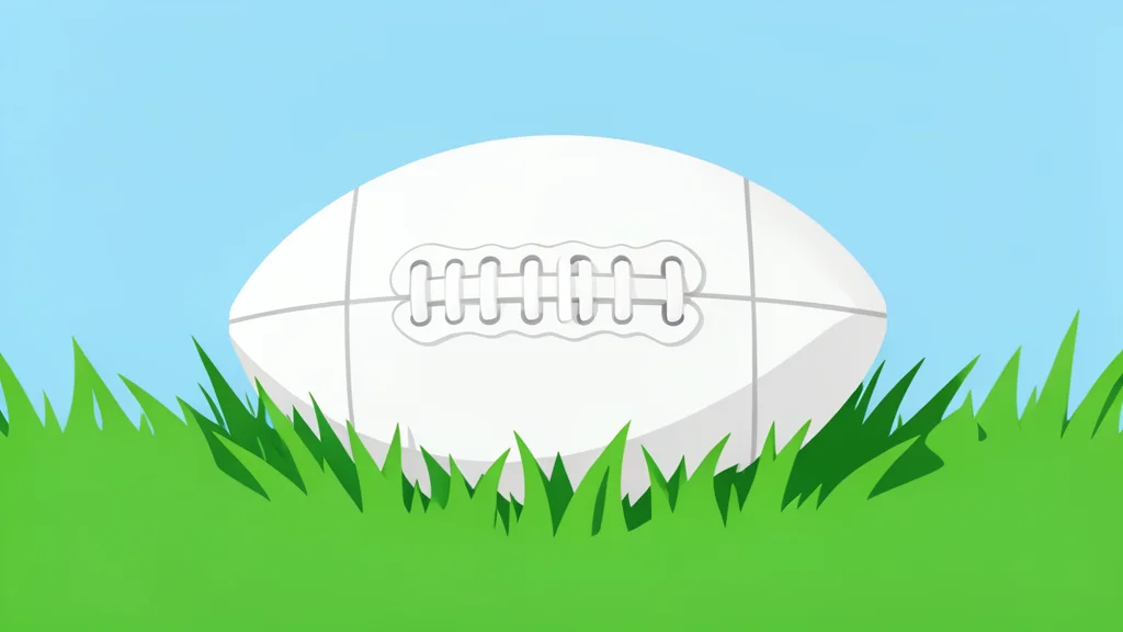 A white football resting on green grass