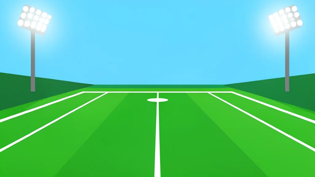 A green football field with white yard lines stretching into the distance under stadium lights