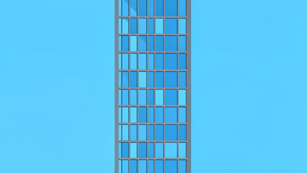 A modern glass skyscraper with a grid of windows reflecting a clear blue sky