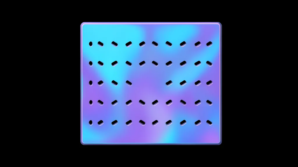 A small, rectangular integrated circuit chip with metallic contacts resting on a dark circuit board