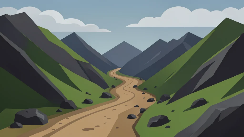 A rugged mountain pass with a winding dirt road and scattered boulders under a cloudy sky