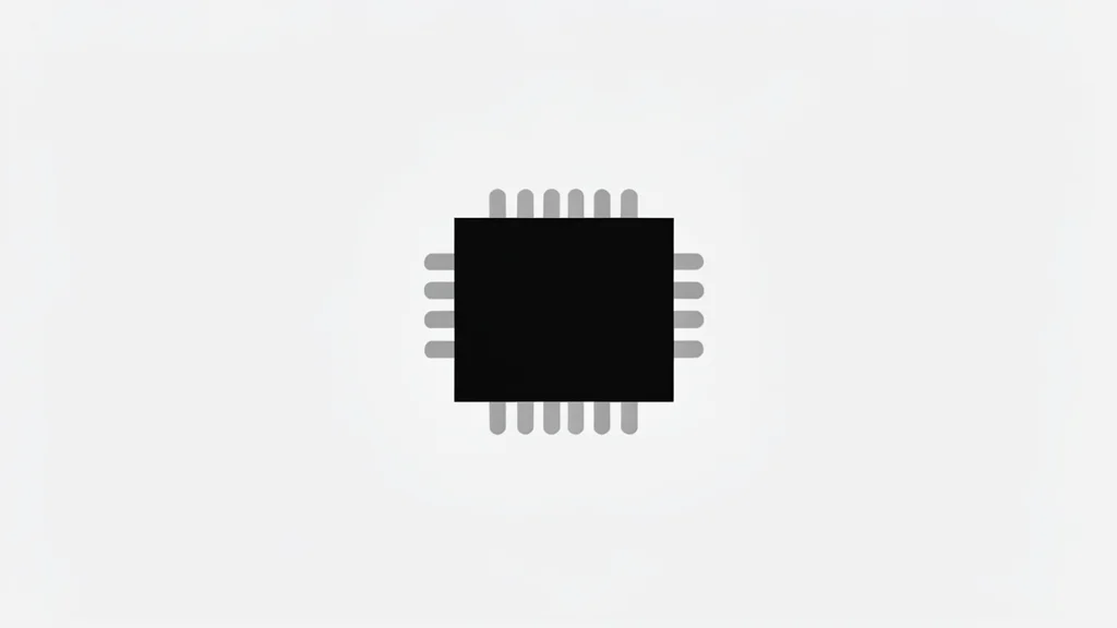 A close-up of a small, black integrated circuit chip resting on a clean, white surface