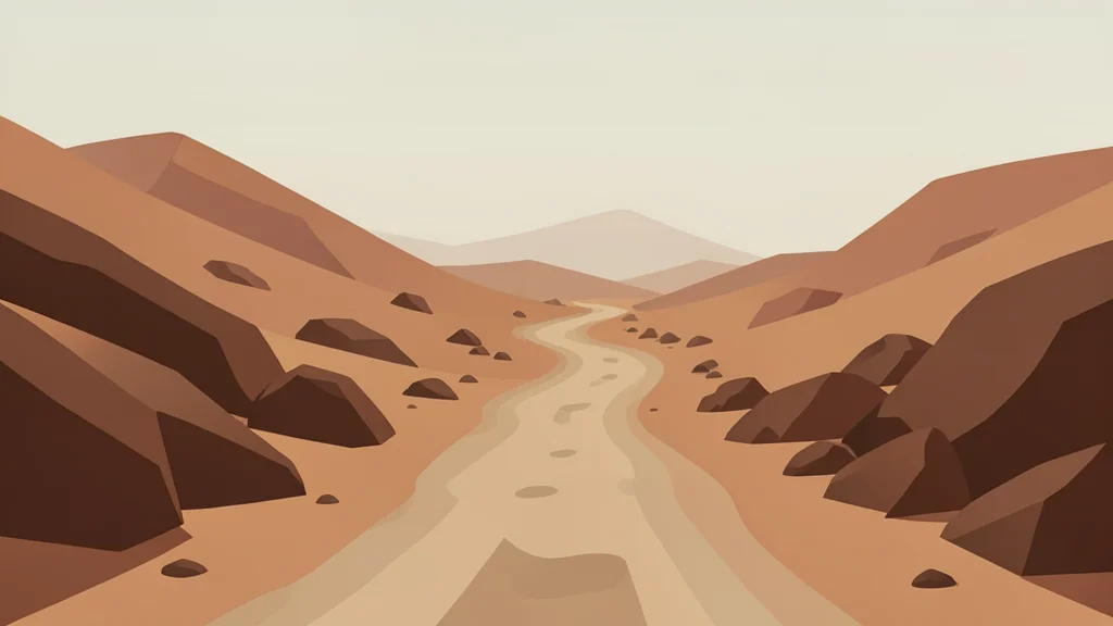 A dusty, unpaved road winding through arid, rocky terrain under a hazy sky
