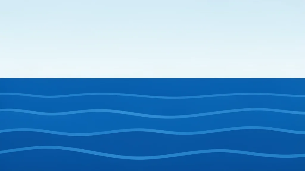 A calm, deep blue ocean surface with gentle ripples under a clear sky