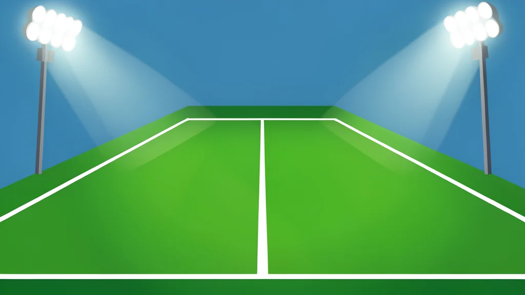 A green football field with white yard lines stretching into the distance under stadium lights