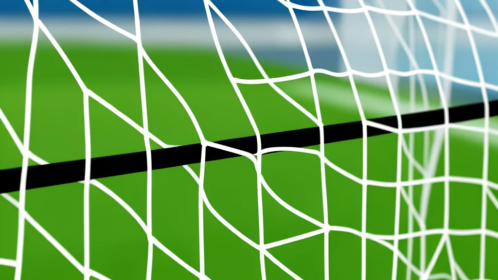 A close-up of a soccer ball resting on the grass near the goal net, with the white boundary lines curving around it.