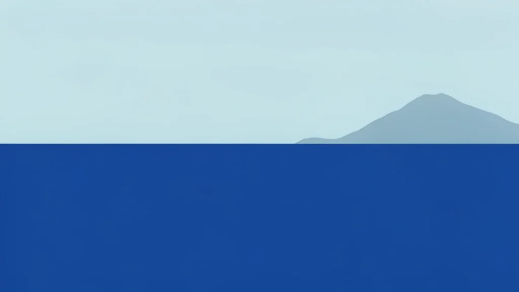 A calm, deep blue ocean horizon with a distant, hazy island silhouette on the right side
