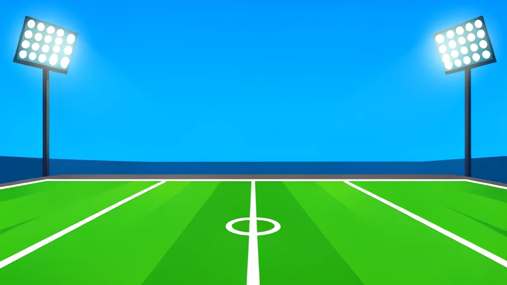 A green football field with white yard lines stretching into the distance under stadium lights