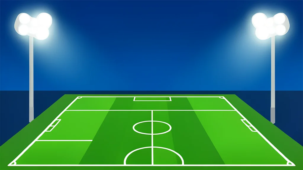 A green football pitch with white boundary lines under stadium floodlights