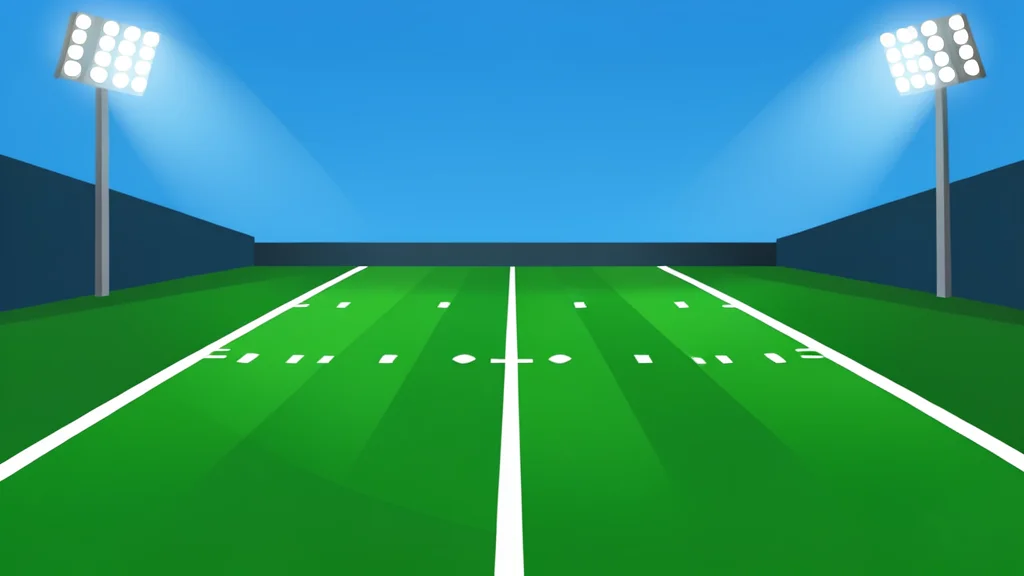 A green football field with white yard lines stretching into the distance under stadium lights