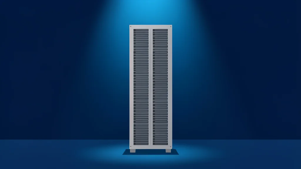 A sleek, metallic server rack standing in a dark, empty room with blue ambient lighting