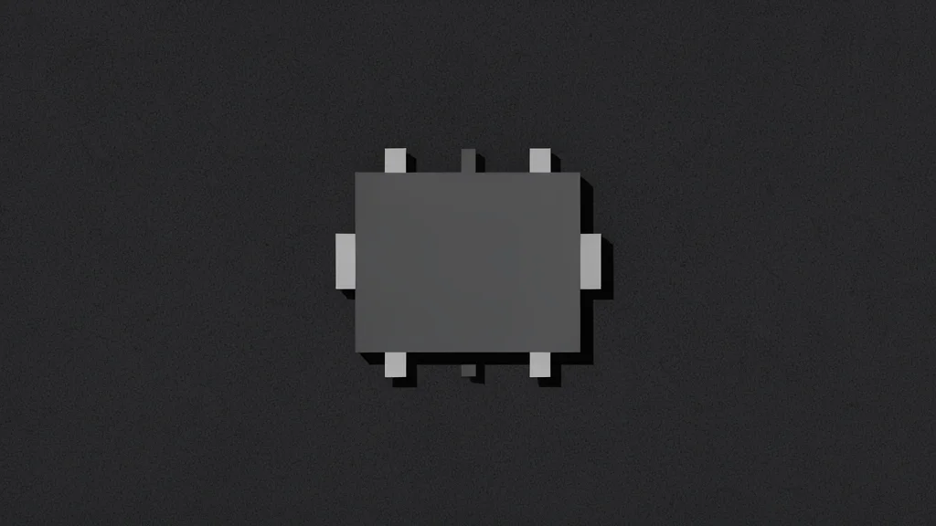 A close-up view of a small, rectangular electronic component with metallic contacts, resting on a dark, textured surface.