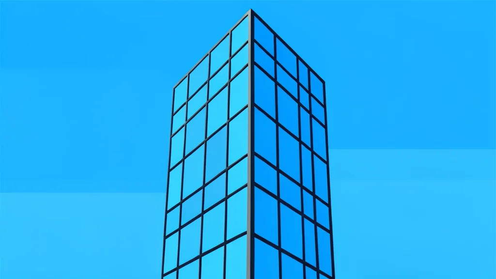 A modern glass skyscraper reflecting a clear blue sky