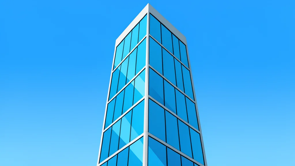 A sleek, modern glass skyscraper reflecting a blue sky