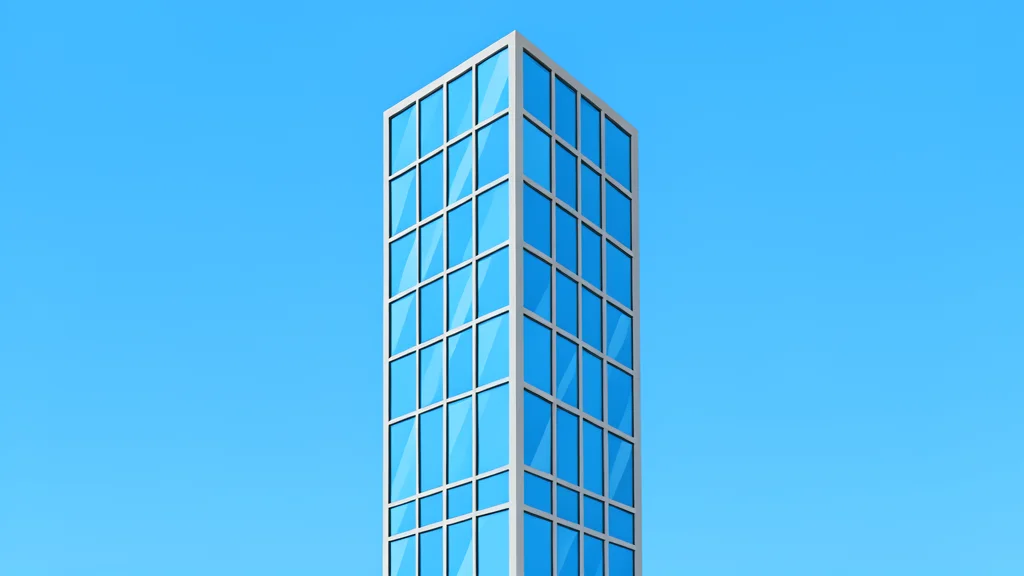 A modern glass skyscraper reflecting a clear blue sky