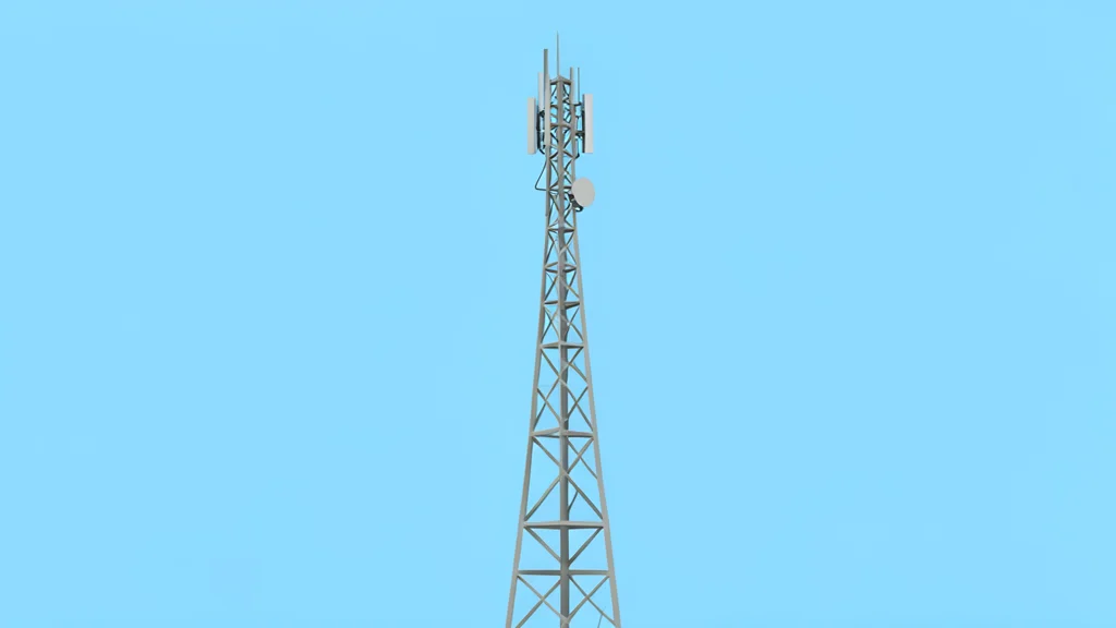 A tall, slender telecommunications tower standing against a clear sky