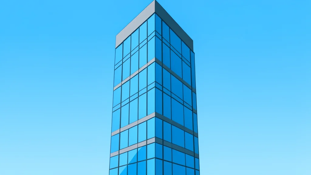 A modern glass skyscraper reflecting the sky