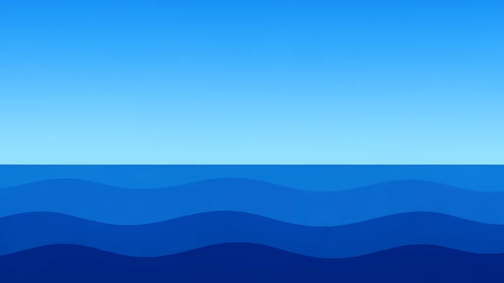A calm, deep blue ocean surface with gentle waves under a clear sky