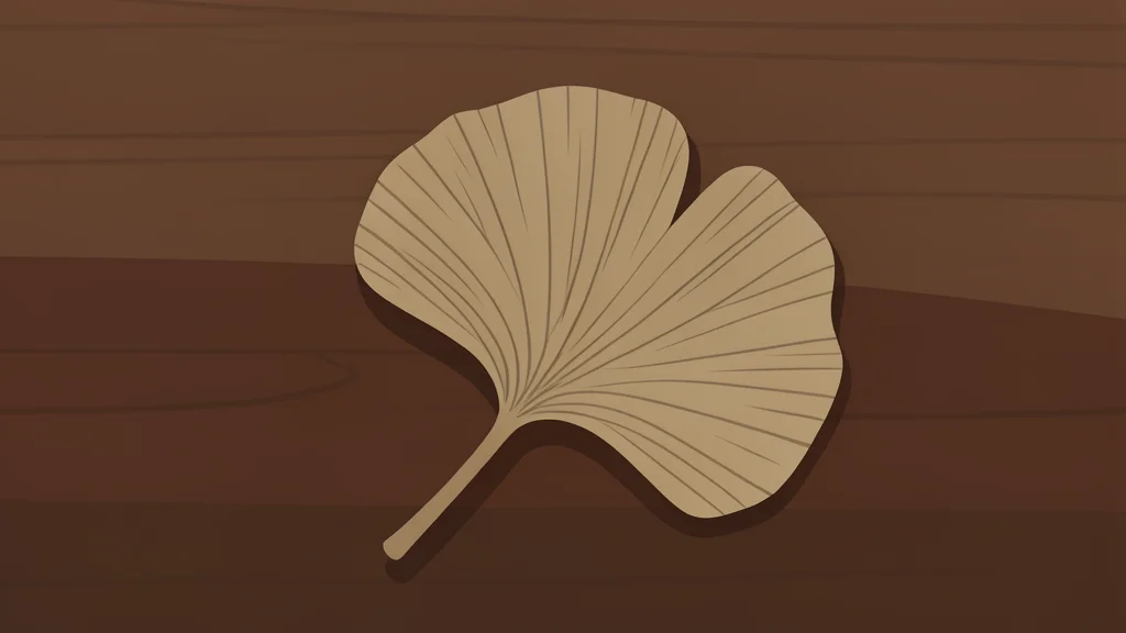 A traditional Japanese wooden ginkgo leaf resting on a polished desk surface