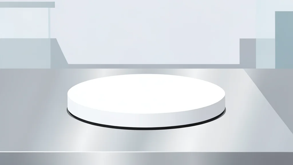 A clean, white wafer resting on a polished metal surface in a sterile laboratory environment