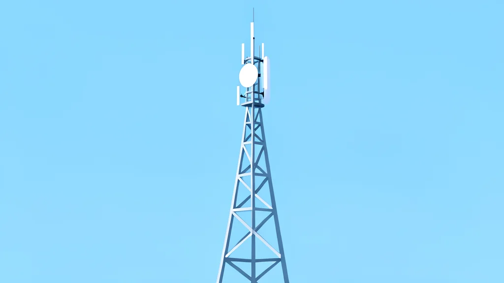 A modern telecommunications antenna tower standing against a clear sky