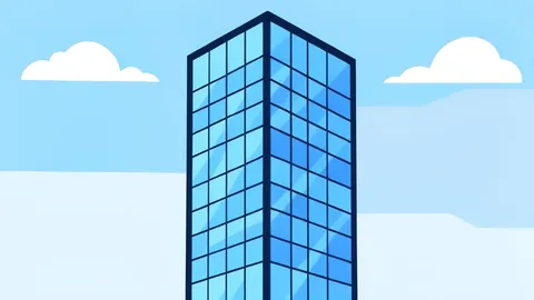 A modern glass skyscraper with a grid-like facade reflecting the sky