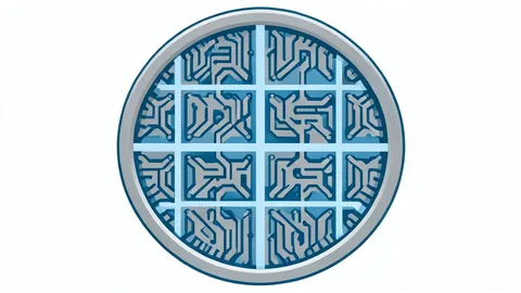 A close-up view of a silicon wafer with intricate circuit patterns
