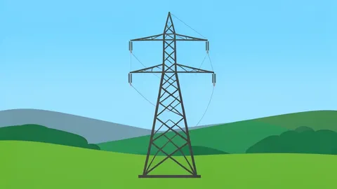 A high-voltage electricity pylon standing in a rural landscape