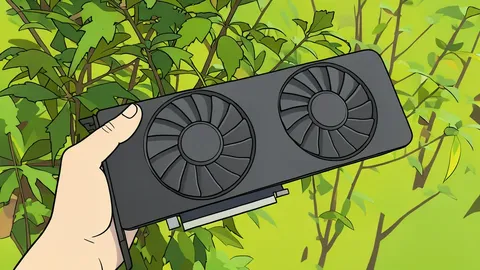 A green circuit board with a black heat sink and a single fan, resting on a wooden desk next to a coiled black power cable.