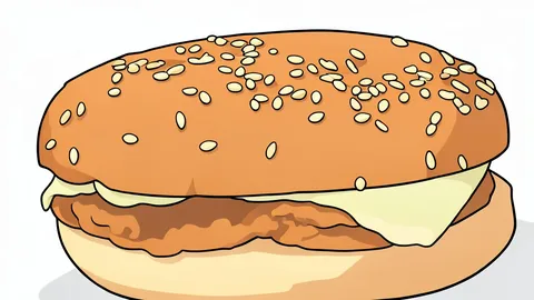 A fresh sub sandwich wrapped in paper on a wooden counter