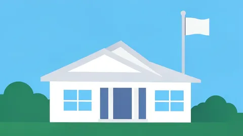 A white house with a flagpole in the background