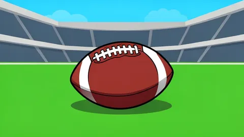 A football resting on the green grass of a stadium field