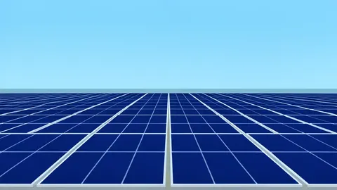 A field of large, dark blue solar panels stretching toward the horizon under a clear sky