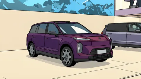 A large, modern electric SUV parked on a smooth asphalt surface