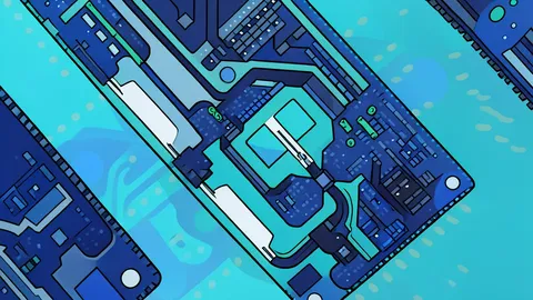 A close-up view of a silicon wafer with a grid of square integrated circuits