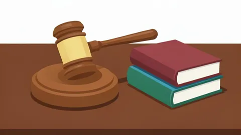 A gavel resting on a wooden desk next to a stack of legal books