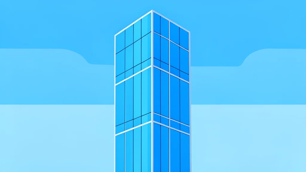 A modern glass skyscraper reflecting a blue sky