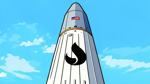 A sleek white rocket stands vertically on a concrete launch pad under a clear blue sky.