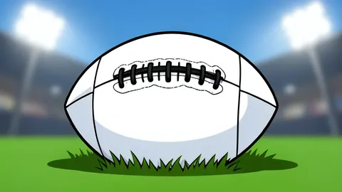 A football resting on green grass