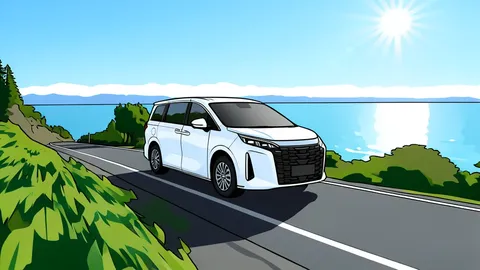A sleek modern minivan parked on a paved road with eucalyptus trees in the background