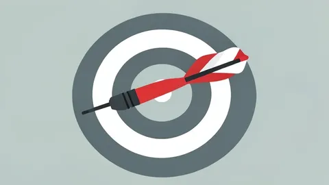 A single red dart with white flights embedded in the center of a circular target board.
