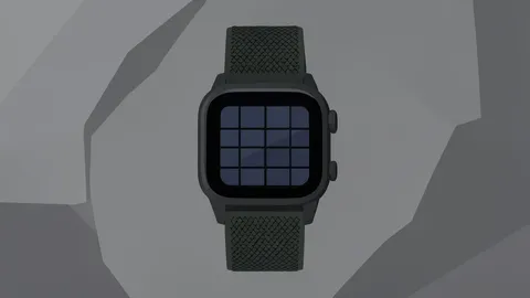 A rugged outdoor smartwatch with a solar panel on the face and a nylon strap, resting on a rocky surface.