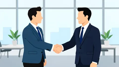 A handshake between two business professionals in a modern office setting