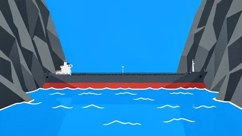 A large oil tanker navigating a narrow rocky strait