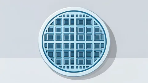 A close-up view of a silicon wafer with a grid of square chips, resting on a clean laboratory surface.